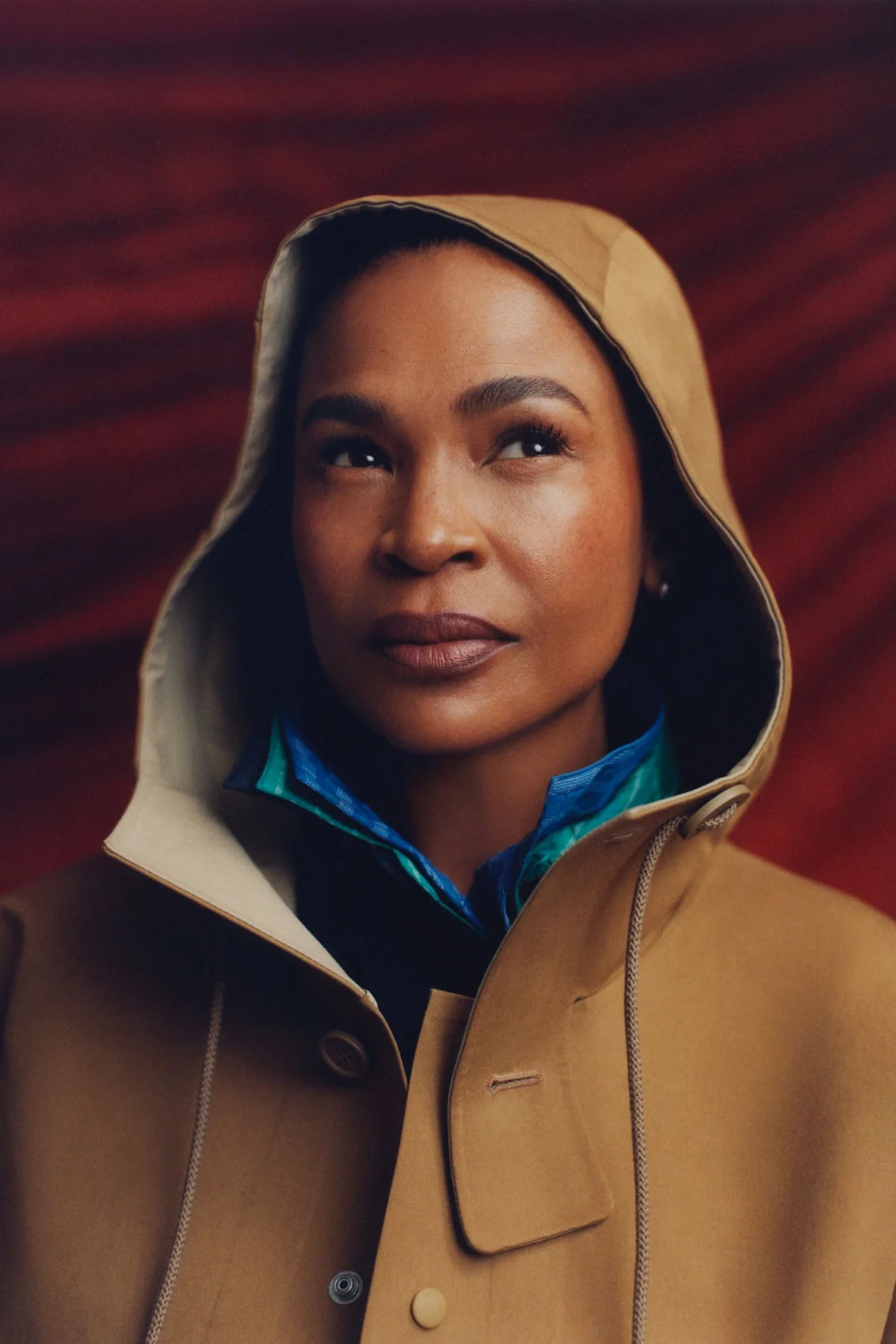 Image may contain Nia Long Face Head Person Photography Portrait Happy Smile Clothing Coat and Jacket